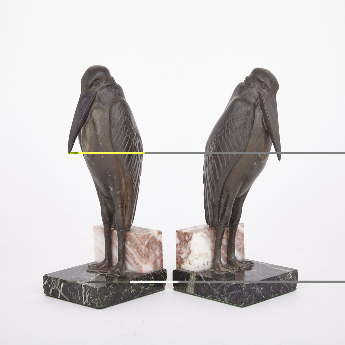 Pair of French Art Deco Patinated Metal Marabou Stork Form Bookends After the Model by Louis Albert Carvin (1875-1951), early 20th century
