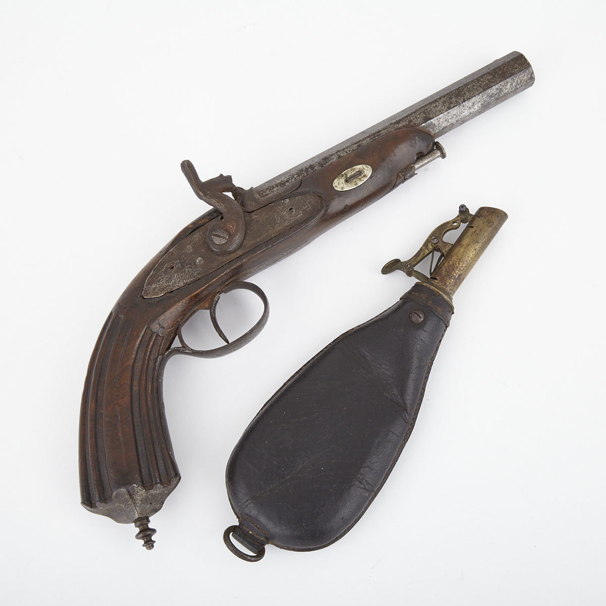 Replica of a Continental 18th century Flintlock Pistol, 20th century, together with a 19th century leather powder flask