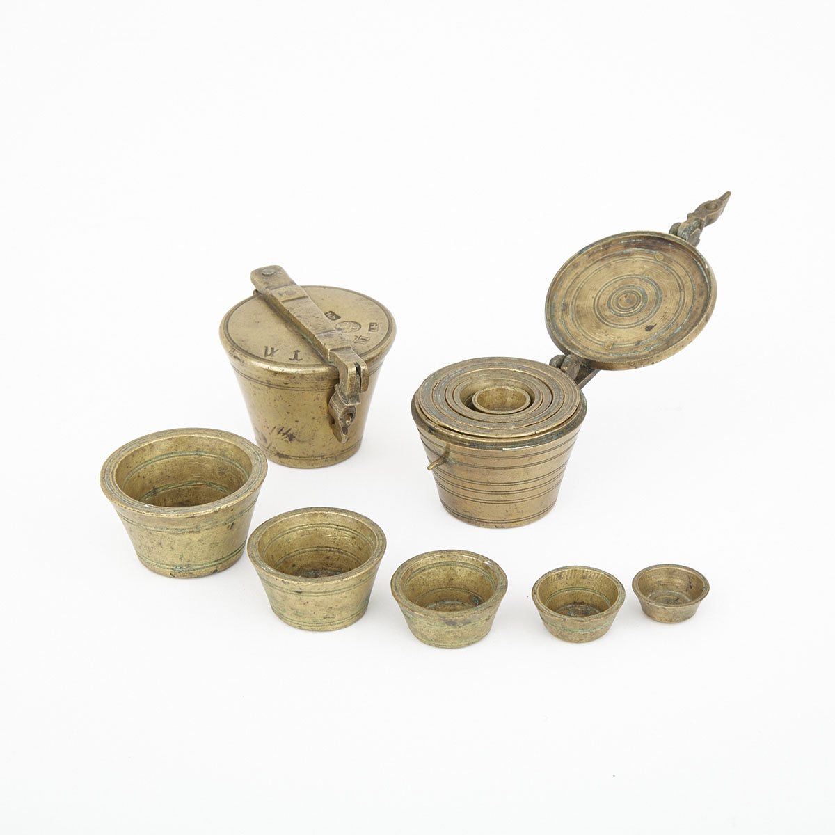Two Sets of Nuremberg Bronze Nesting Weights, Germany, mid 18th century