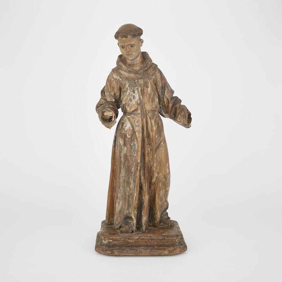Spanish Baroque Carved Walnut Figure of a Franciscan Saint, 18th century