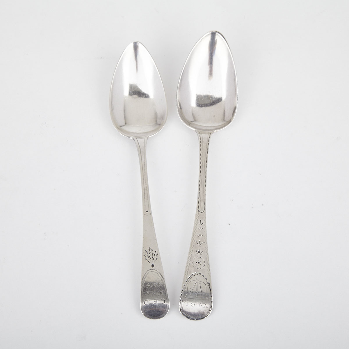 Two Channel Islands Silver Bright-Cut Old English Pattern Table Spoons, Jacques Quesnel and Charles William Quesnel, Jersey, early 19th century