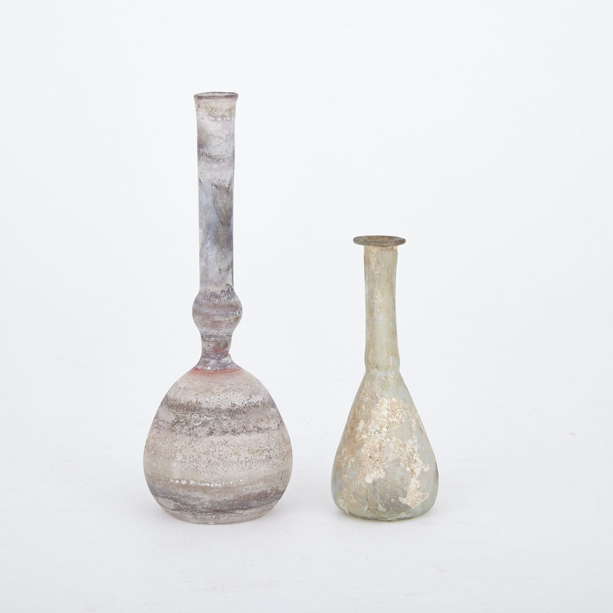 Two Small Eastern Mediterranean (Roman) Glass Bottles, 1st-2nd century AD