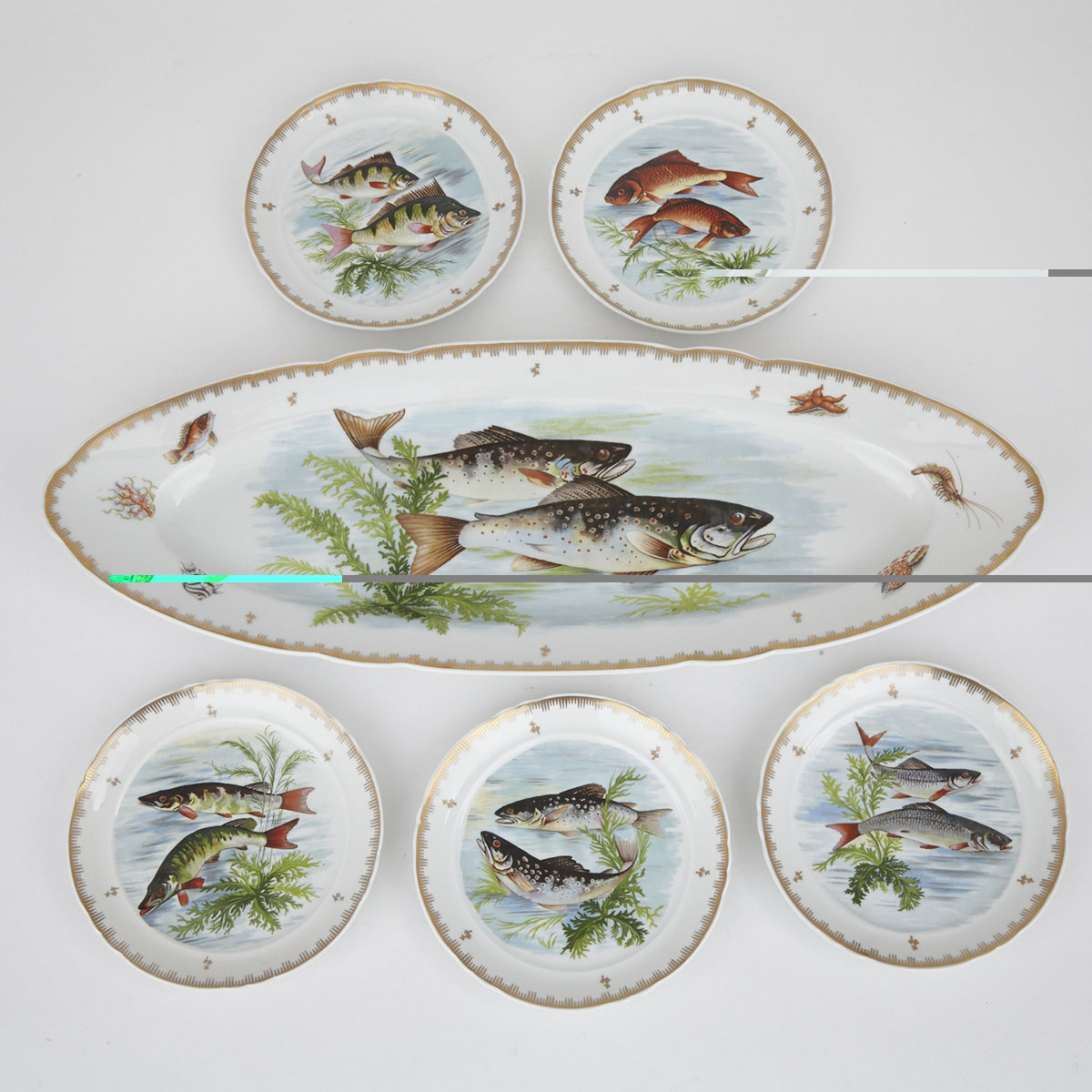 French Porcelain Oval Fish Platter and Five Plates, 20th century