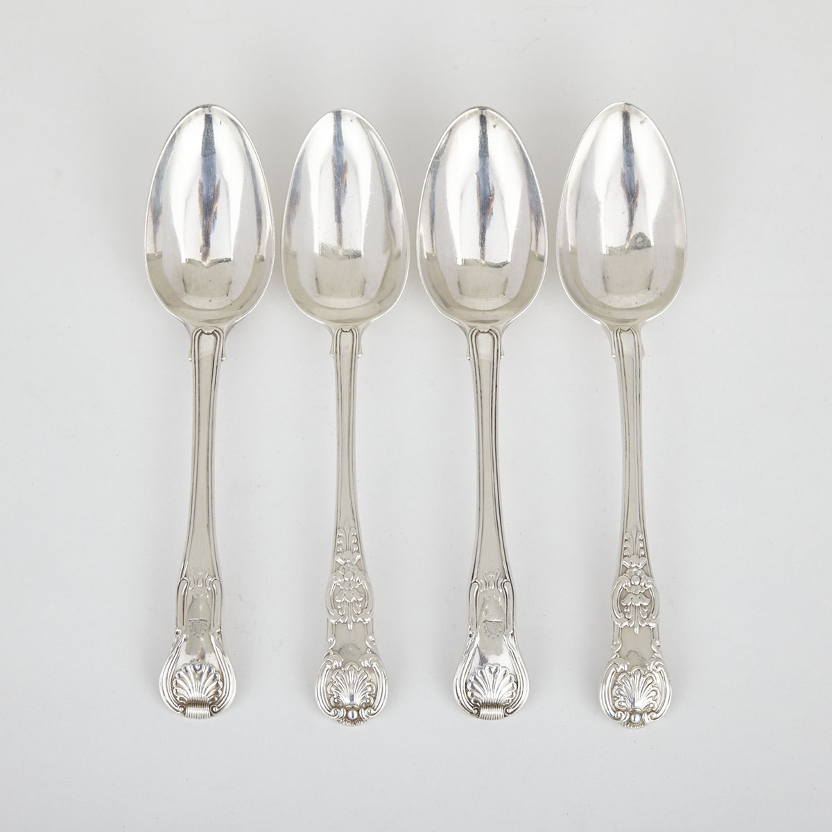 Pair of George III Silver Hourglass Pattern Table Spoons, Josiah & George Piercy, London, 1816 and Pair of George IV Queens Pattern Table Spoons, William Chawner II, 1822/23