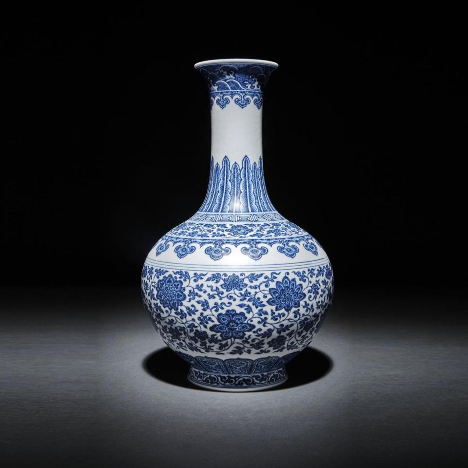 A Ming-Style Blue and White ‘Lotus’ Bottle Vase, Qianlong Mark 