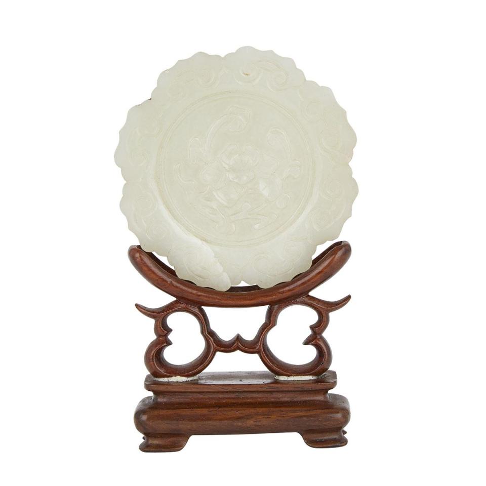 A Large Pale White Jade Floral Pendant with a Rosewood Stand, 18th Century