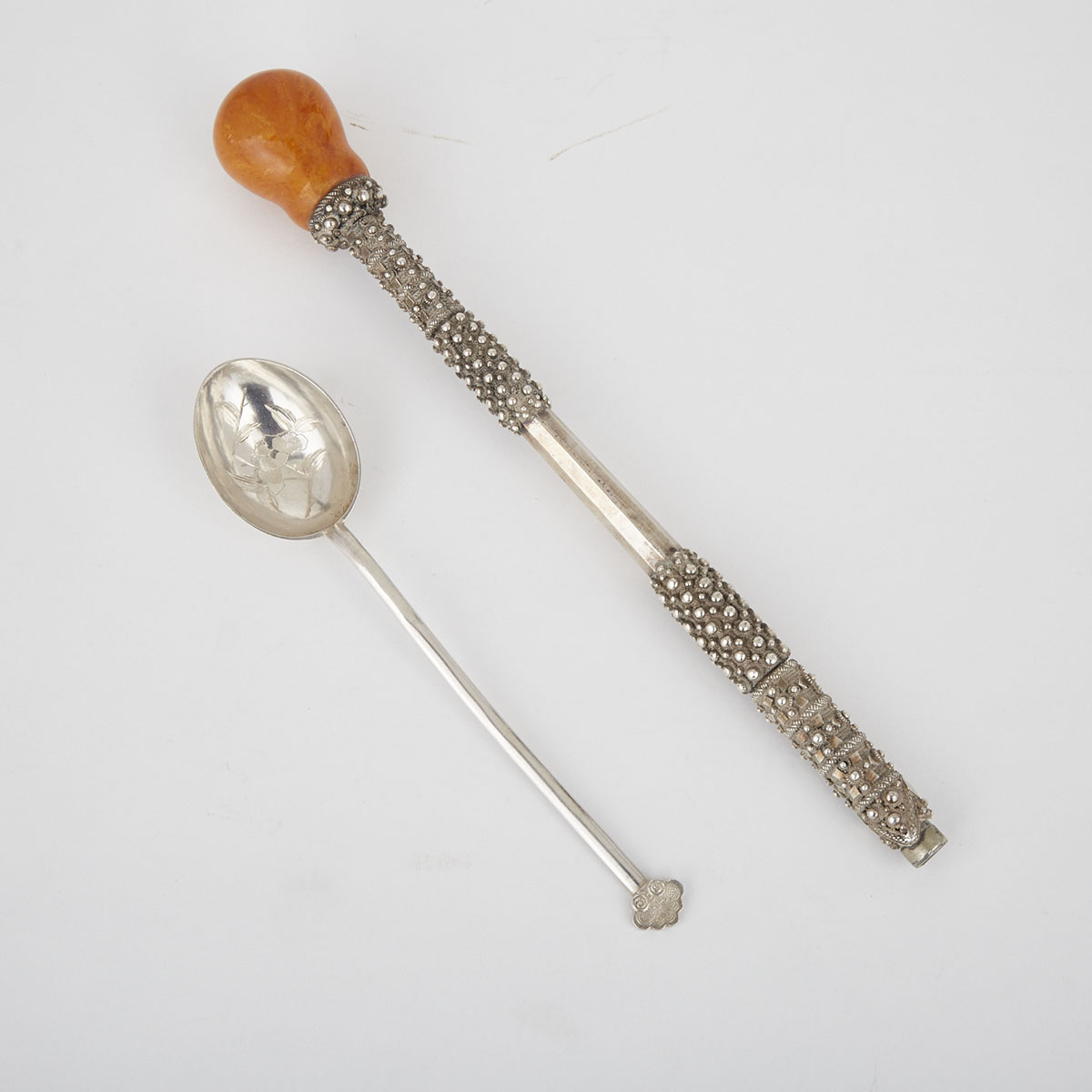 A Silver and Amber Parasol Handle and a Chinese Export Silver Spoon, Early 20th Century