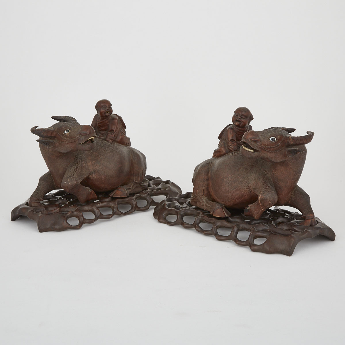 A Pair of Carved Rosewood Buffalo with Boys, Republic Period 