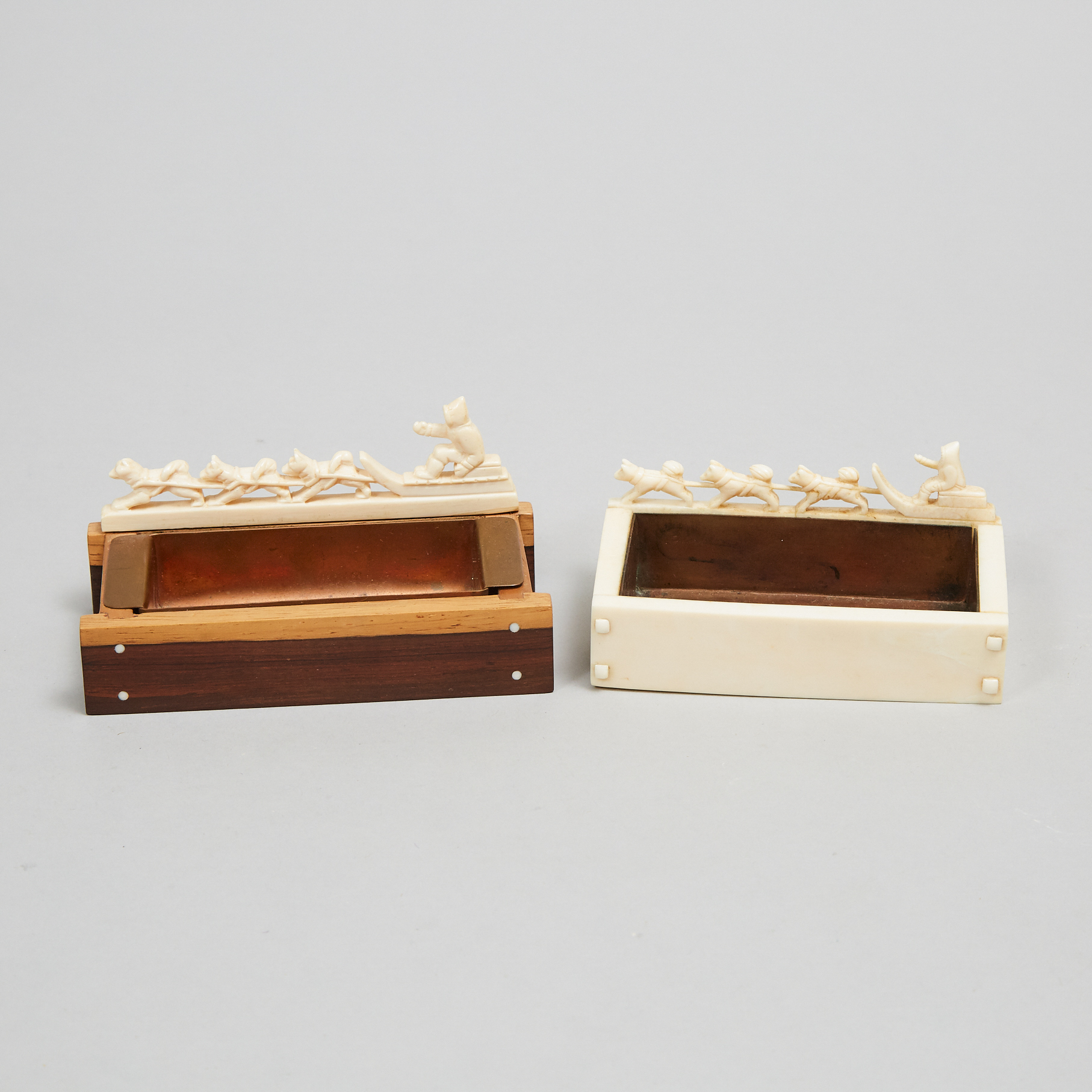 Two Grenfell Labrador Industries Marine Ivory Dog Sled and Team Form Vide Poches, mid 20th century