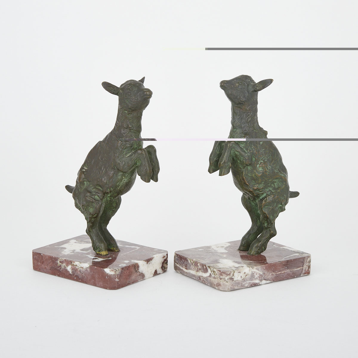 Pair of Patinated Bronze Lamb Form Bookends, early 20th century