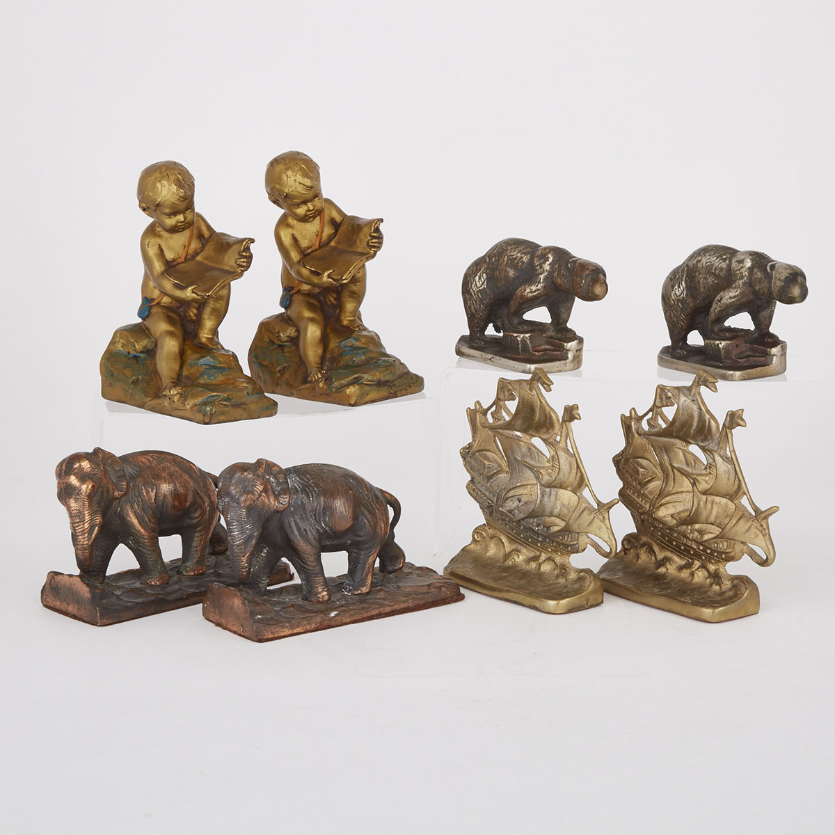 Four Pairs Metal Bookends, early 20th century