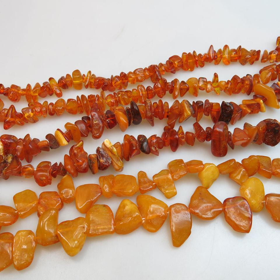 Three Tumbled Amber Necklaces; 50”; 27’; 24”