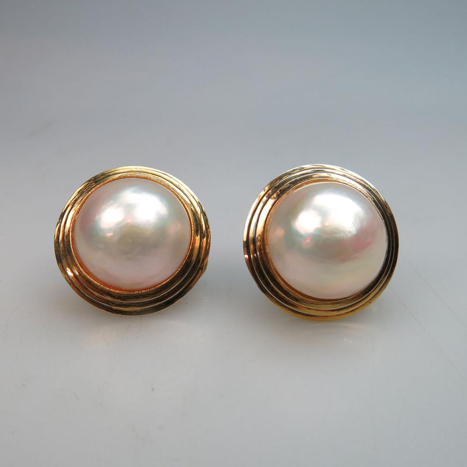 A Pair Of 14k Yellow Gold Button Earrings