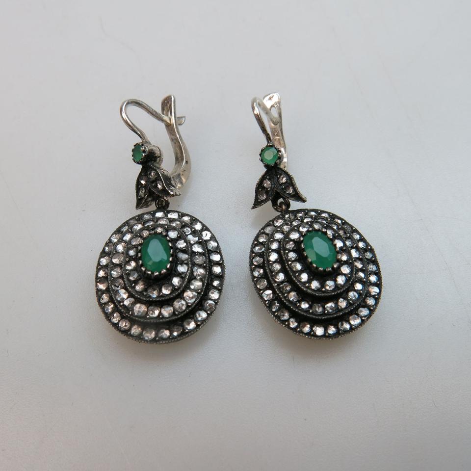 A Pair Of Silver Drop Earrings