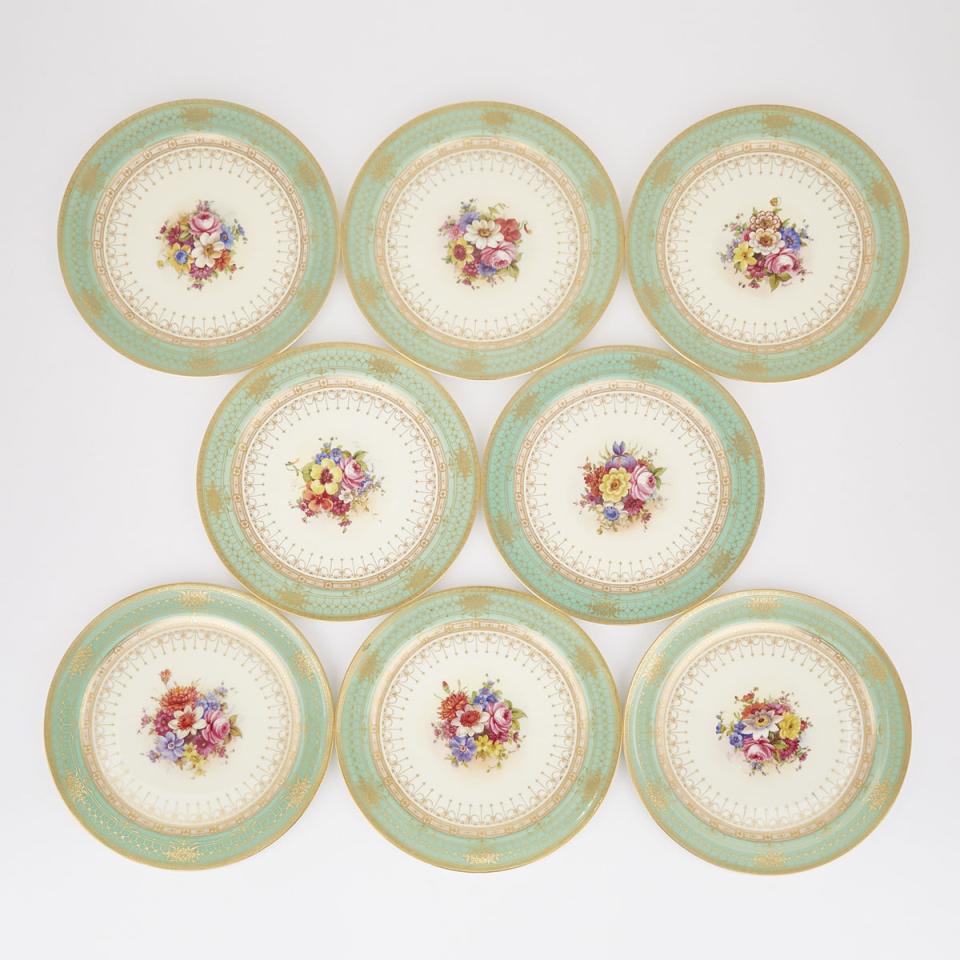 Eight Royal Worcester Apple Green Banded Service Plates with Floral Centres, John H. Freeman, c.1935-39