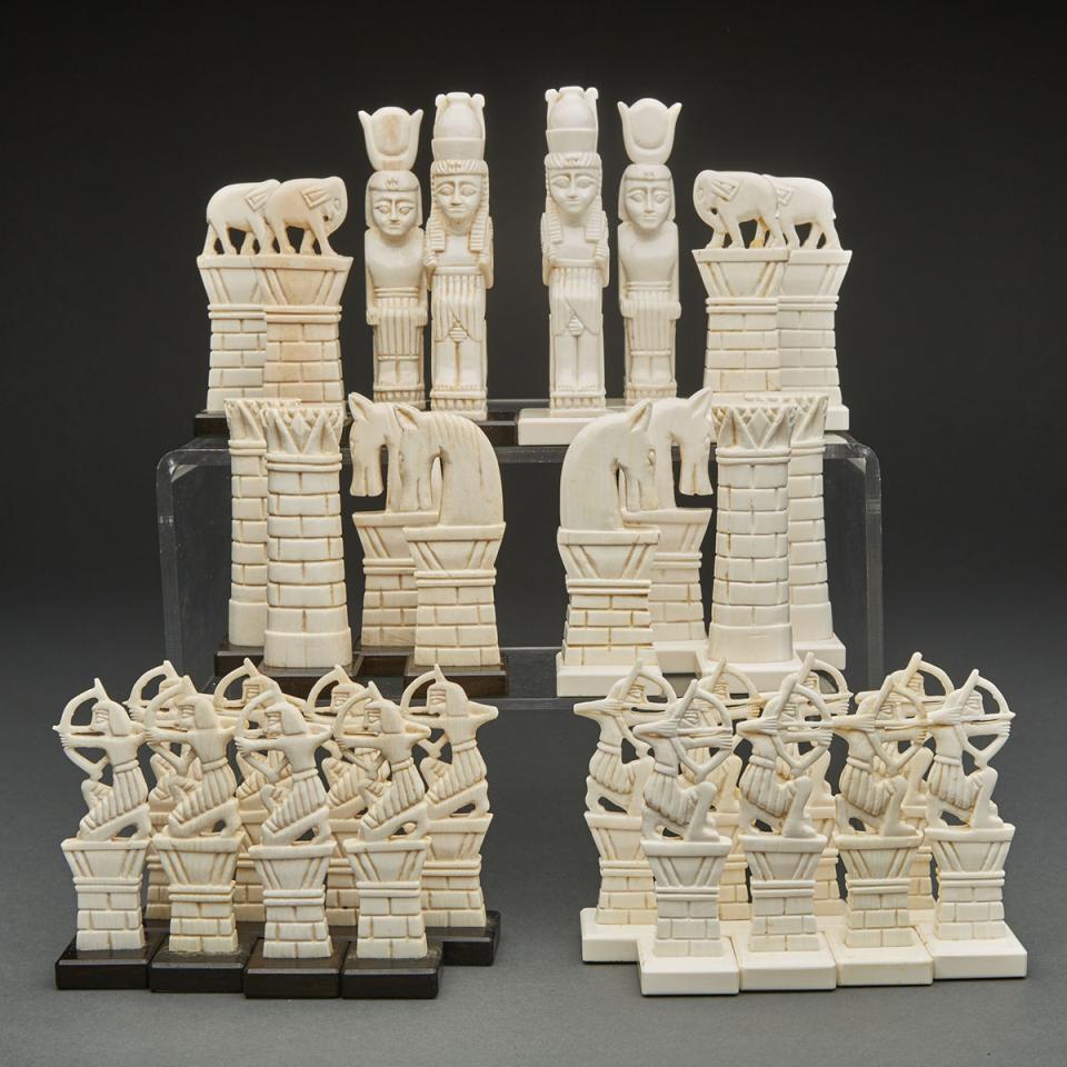 Ancient Egyptian Themed Carved Ivory and Ebony Chess Set, mid 20th century