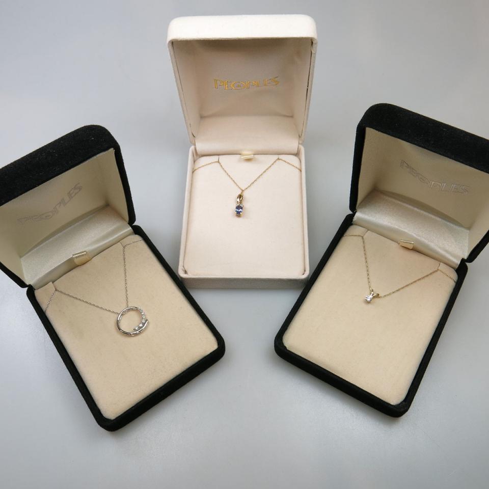 Three Yellow Gold Pendants and chains