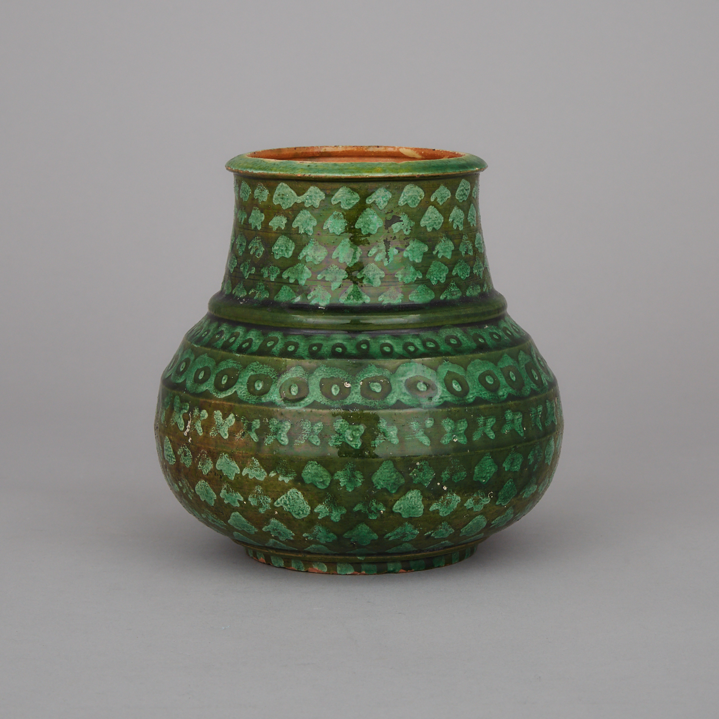 A Patterned Green Glazed Ceramic Vessel 