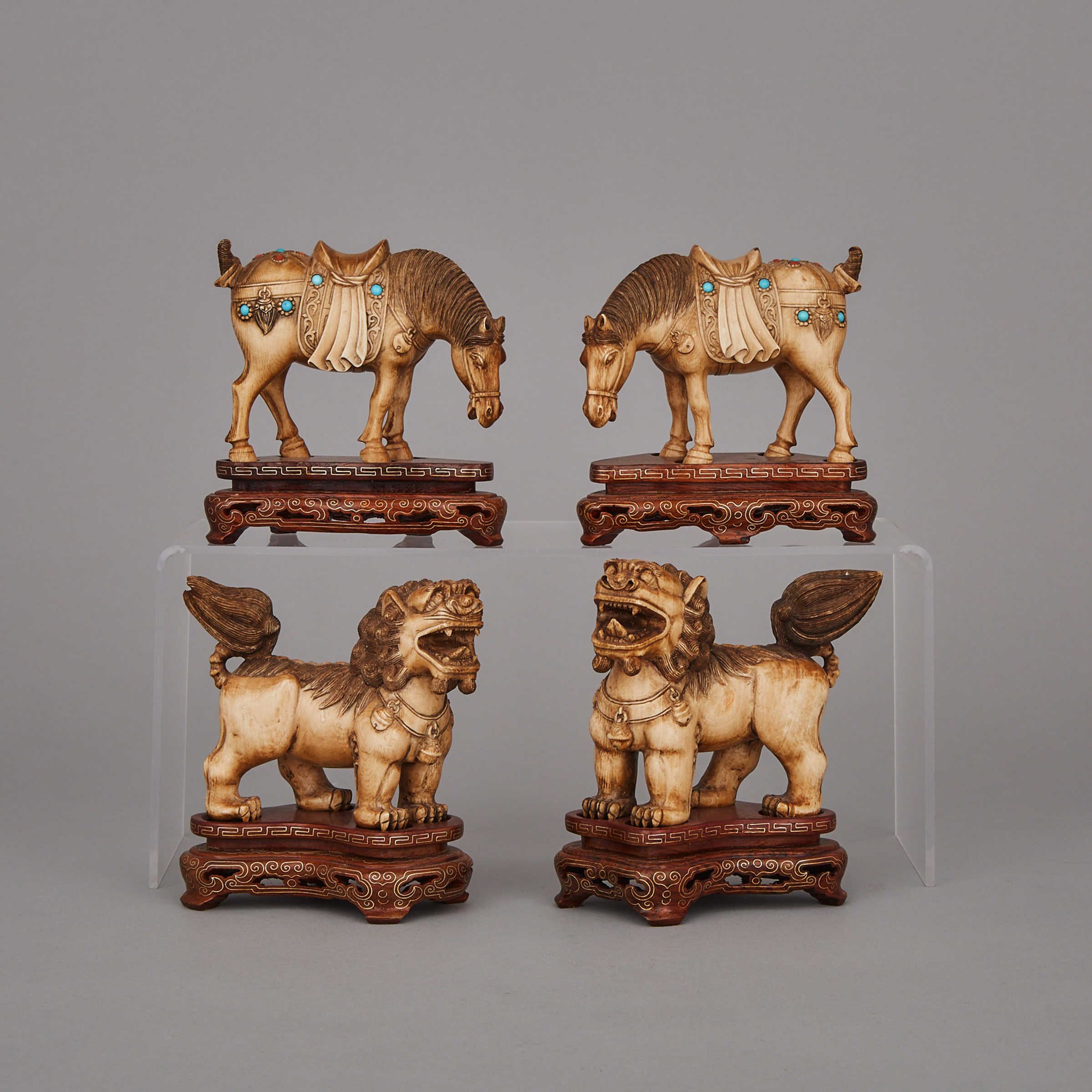 A Group of Four Ivory Carved Beasts