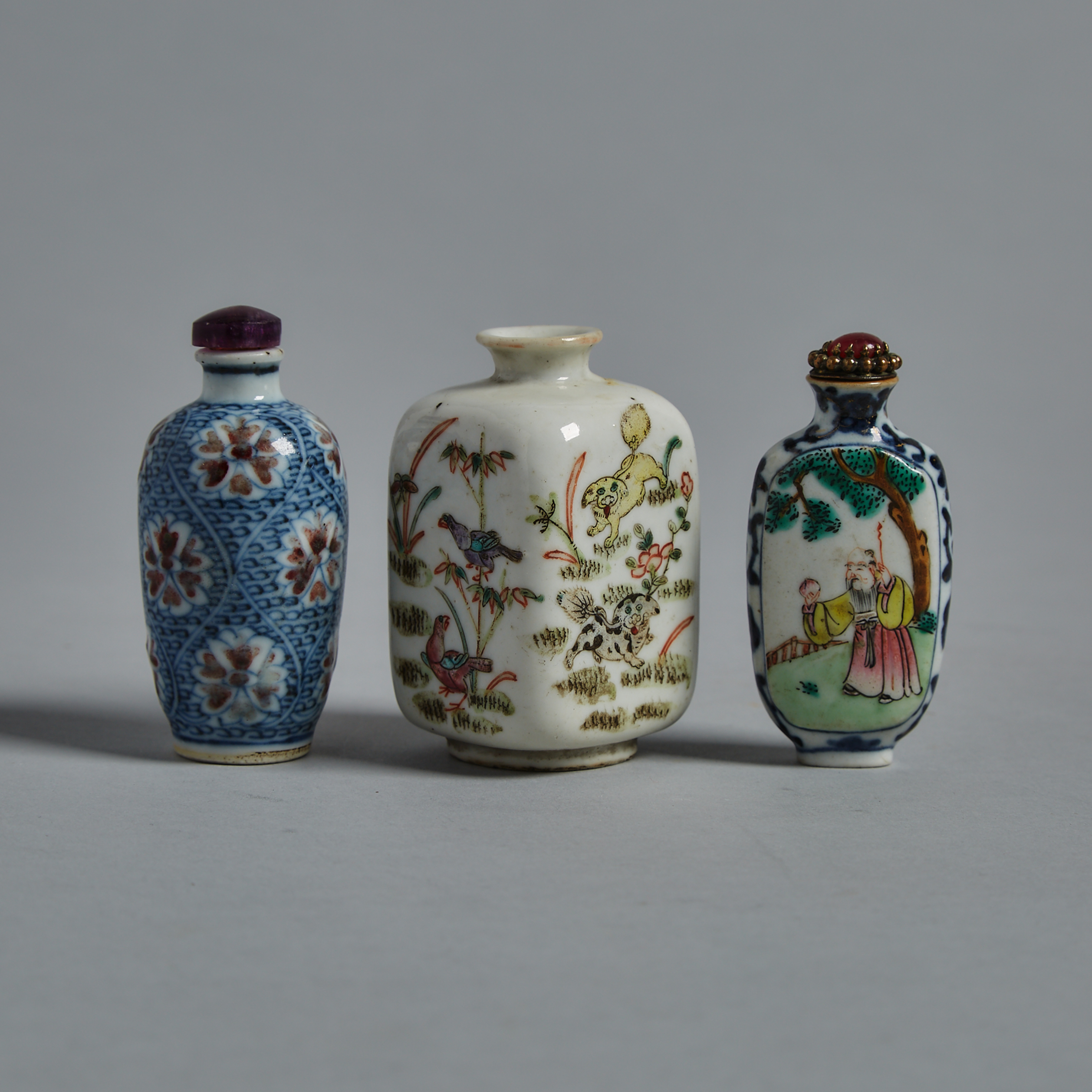 A Group of Three Porcelain Snuff Bottles