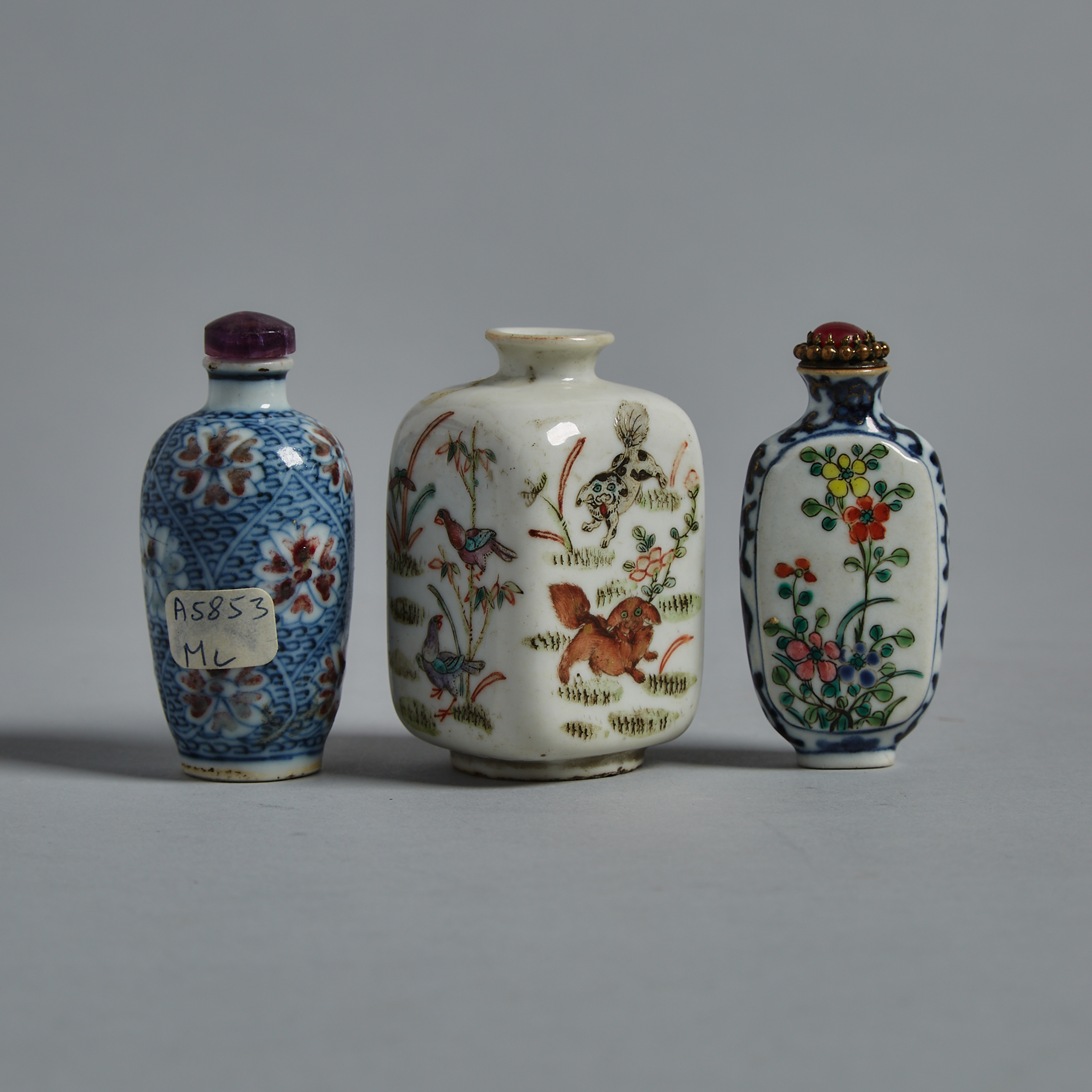A Group of Three Porcelain Snuff Bottles