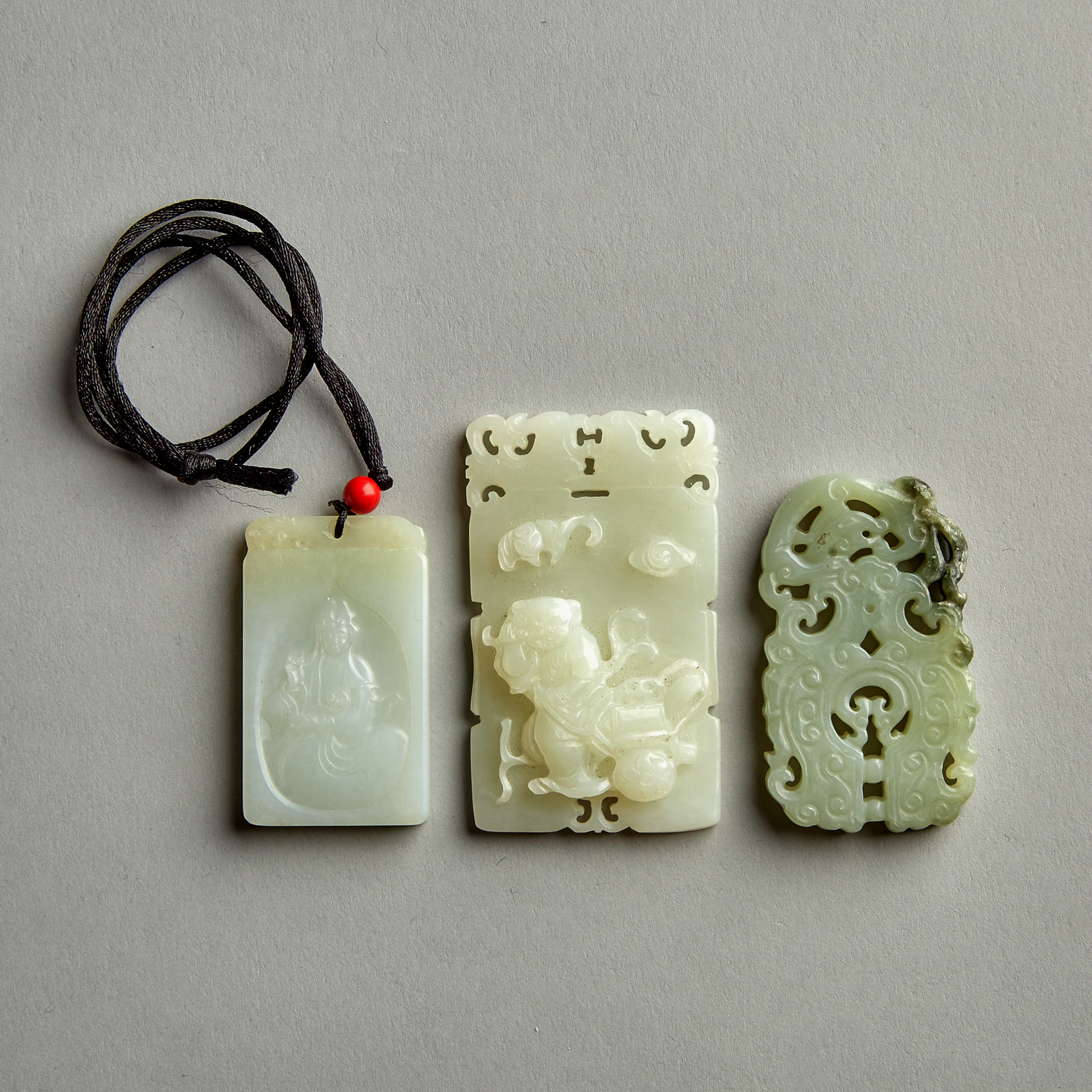A Group of Three Jade Plaques