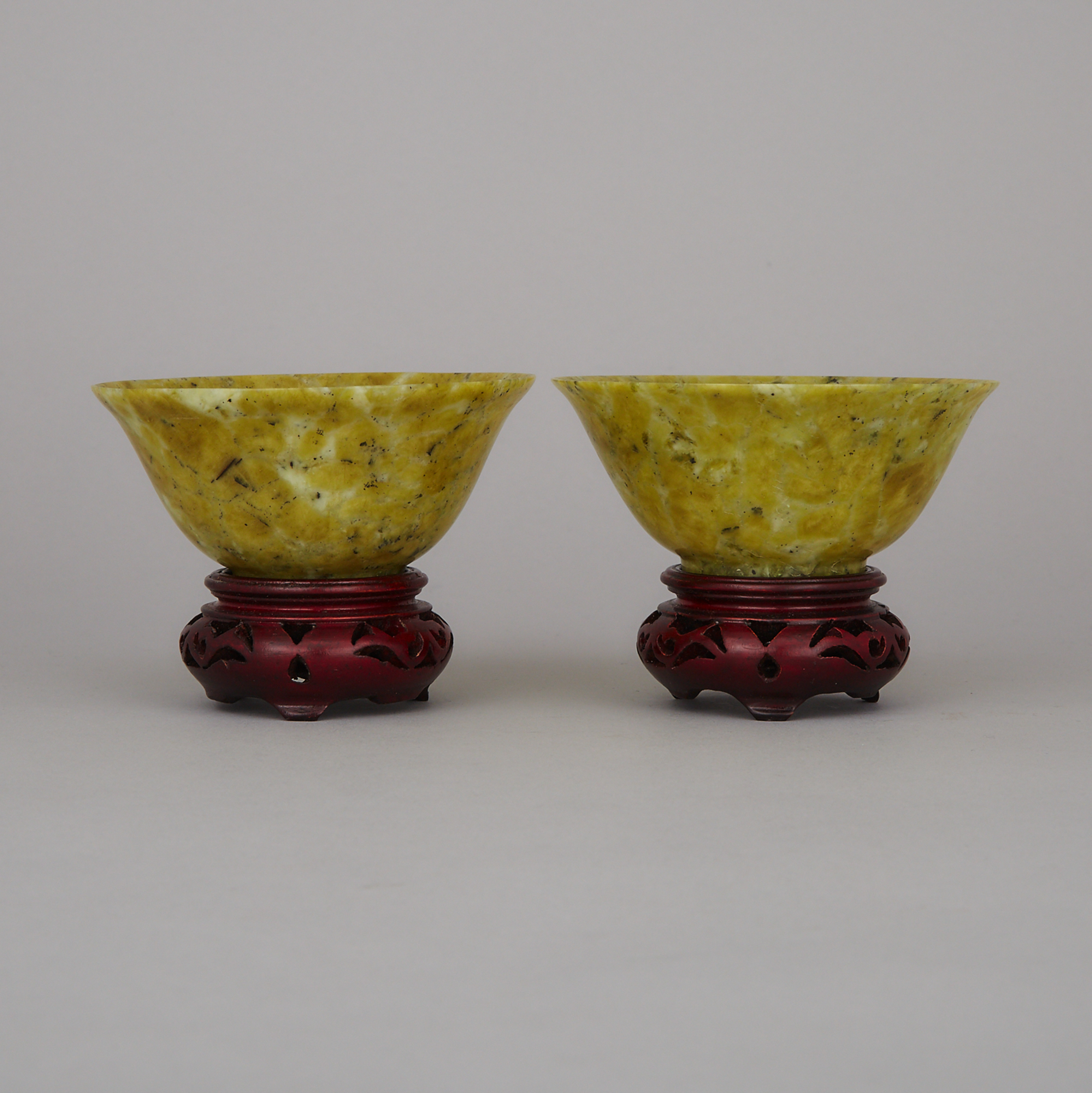 A Pair of Green Hardstone Bowls with Stands