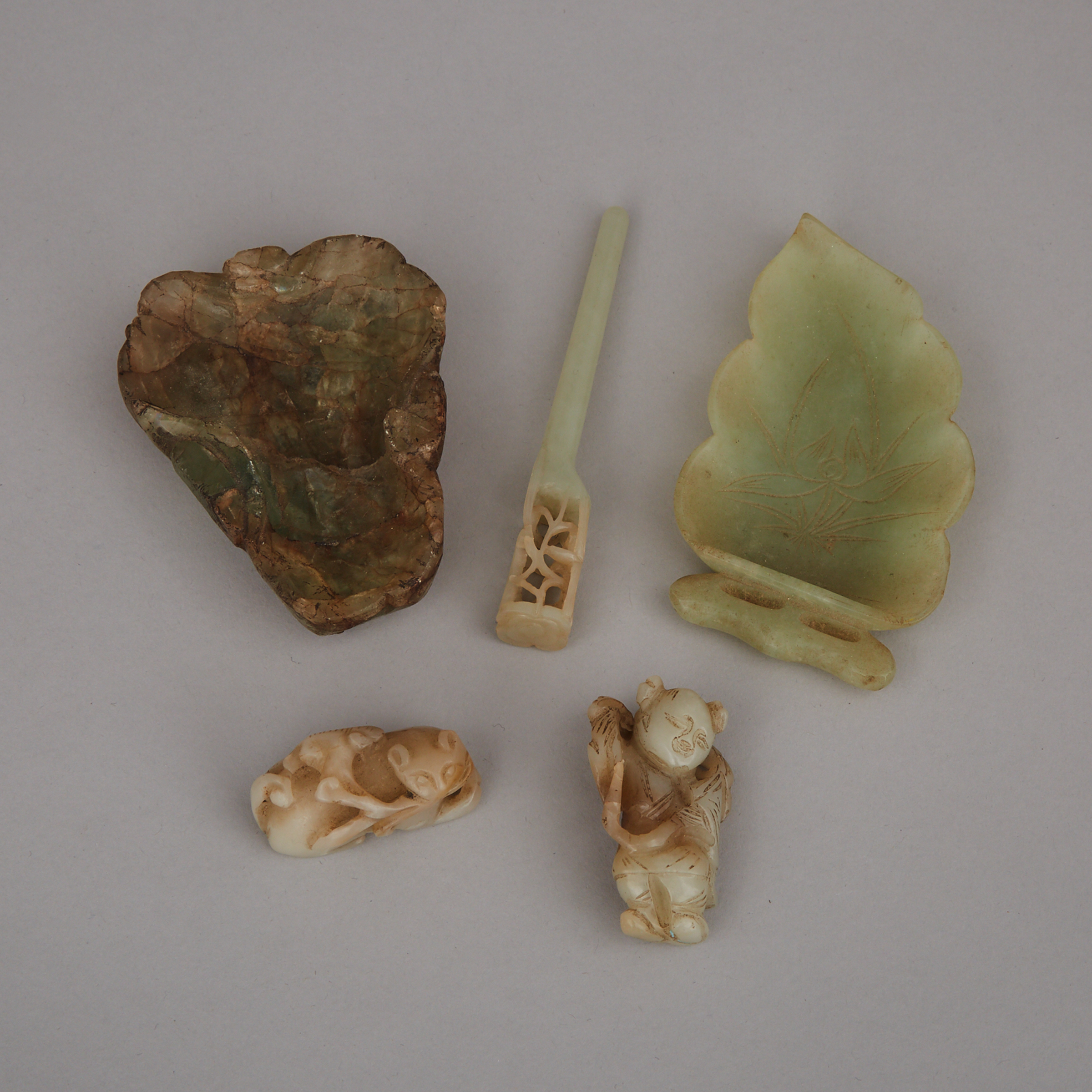 A Group of Five Jade and Hardstone Carvings