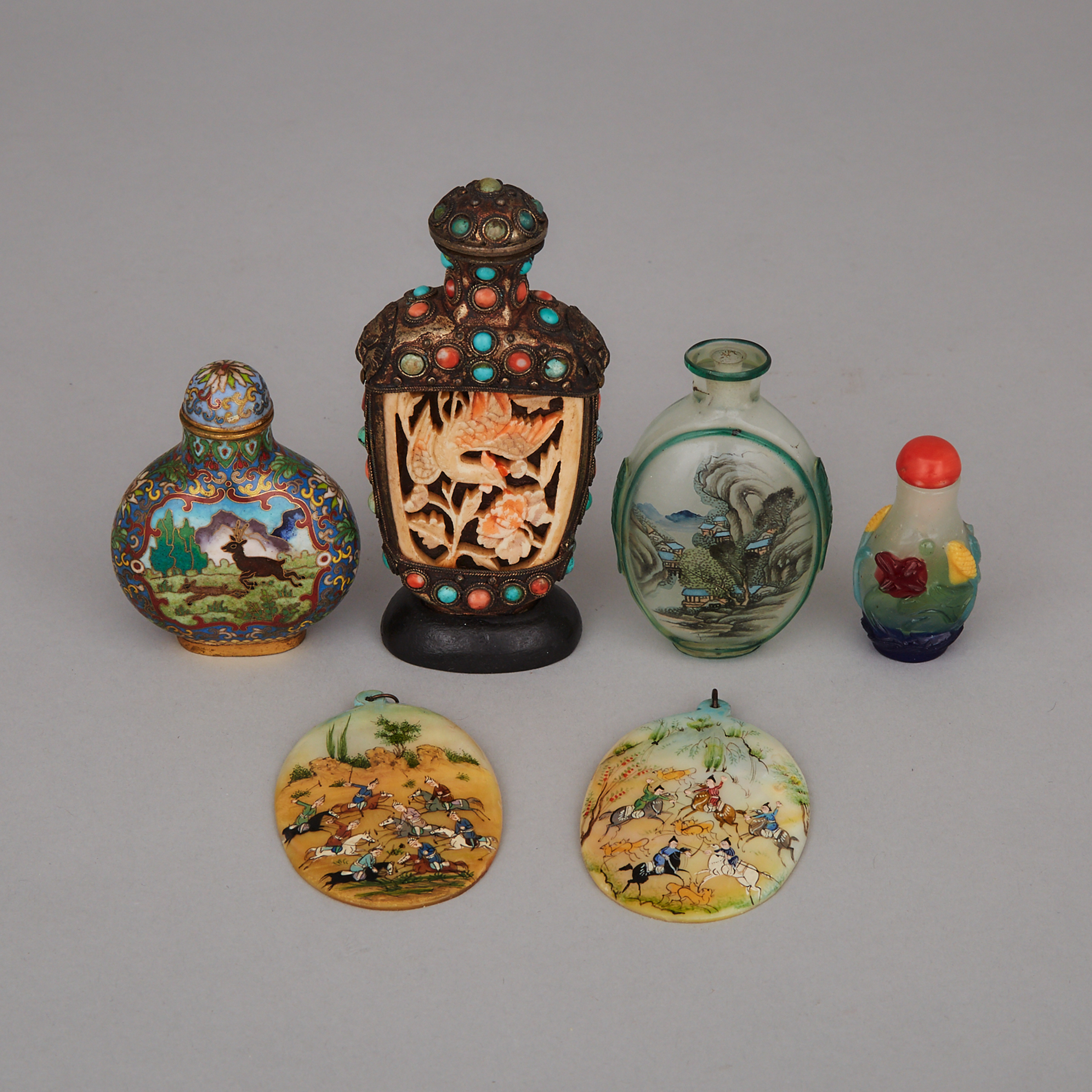 A Group of Six Snuff Bottles and Pendants