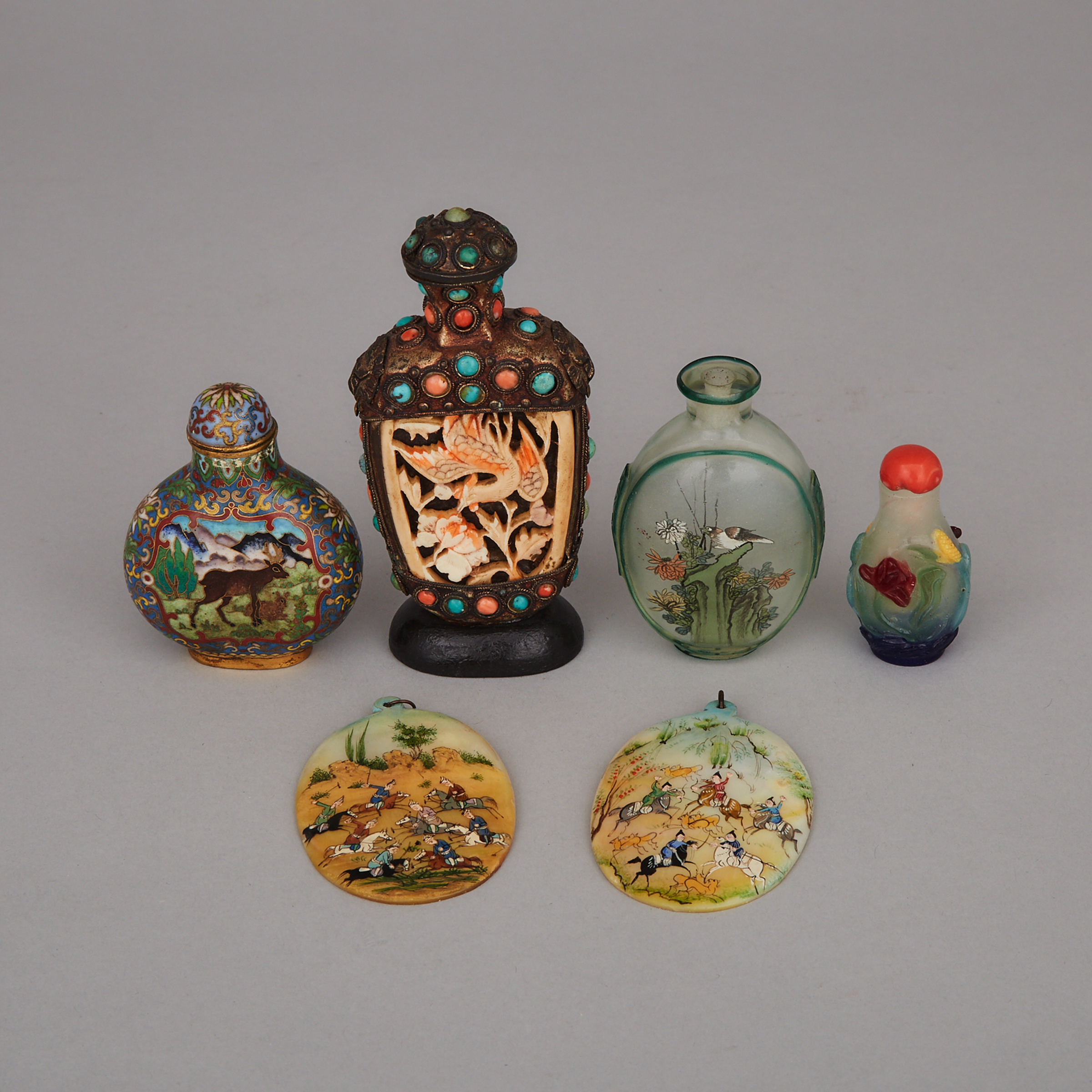 A Group of Six Snuff Bottles and Pendants