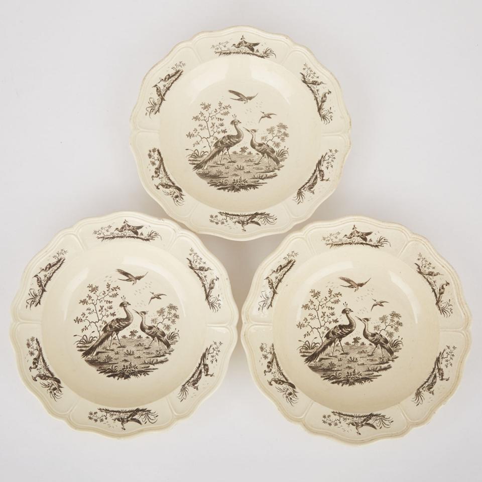 Three English Moulded Creamware ‘Liverpool Birds’ Soup Plates, late 18th century 