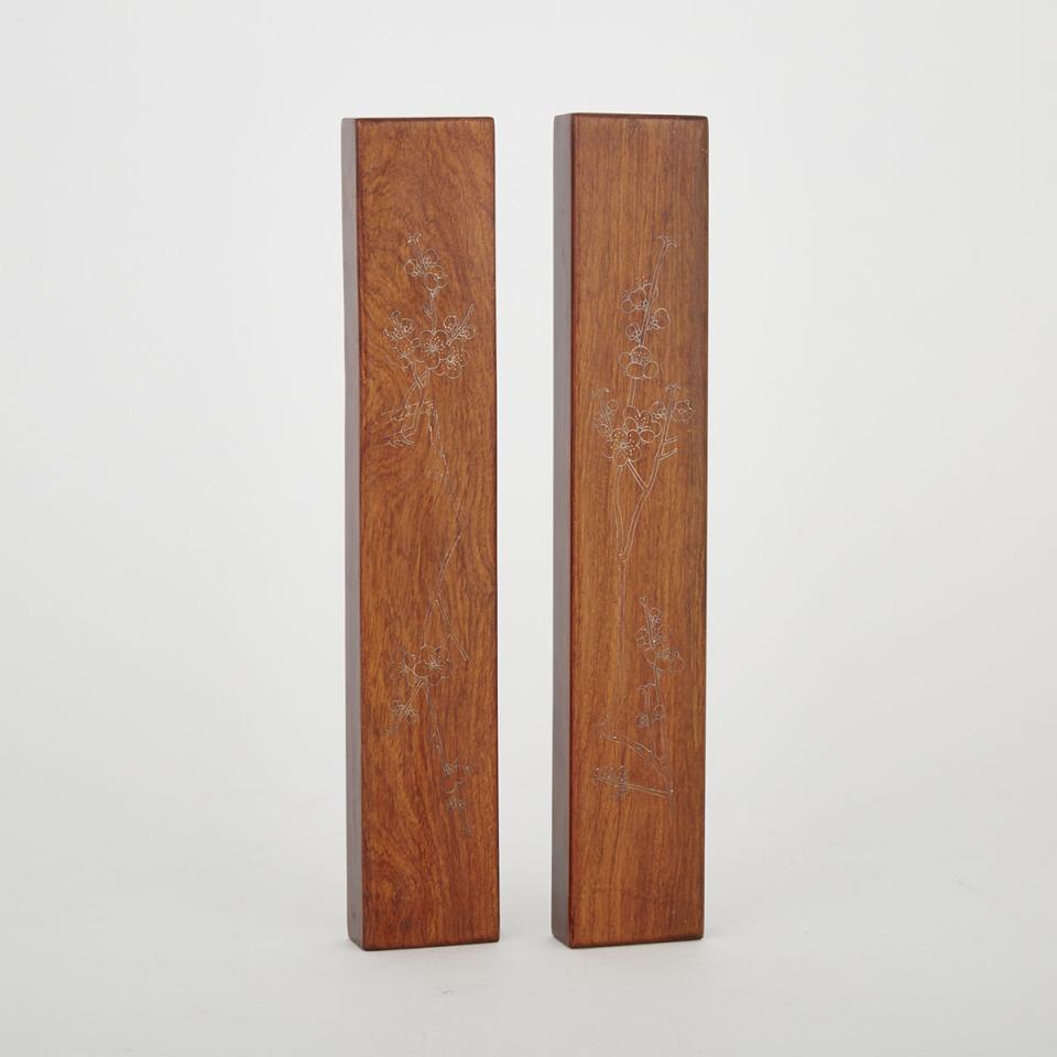 A Pair of Silver Inlaid Hardwood Scroll Weights