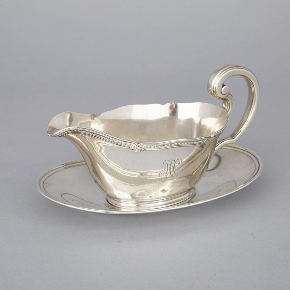 American Silver Sauce Boat, Tiffany & Co., New York, N.Y., and a Stand, International Silver Co., Meriden, Ct., 20th century