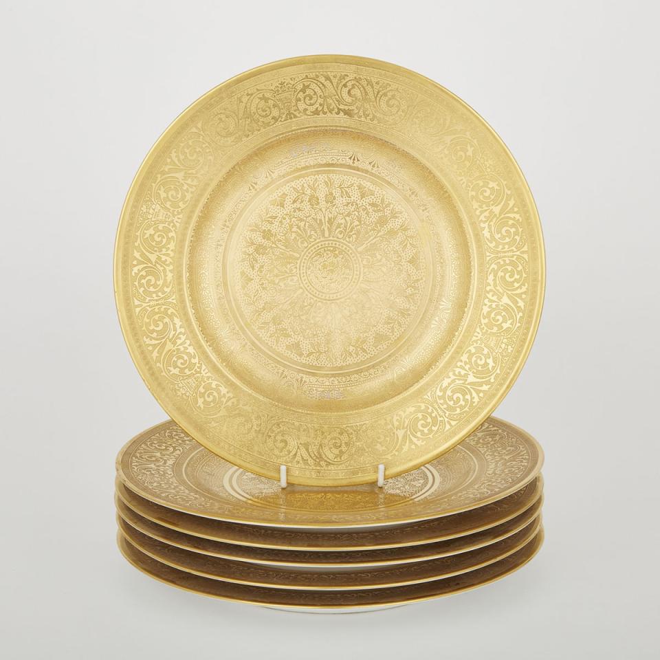 Six Hutschenreuther Raised and Burnished Gilt Decorated Service Plates, 20th century