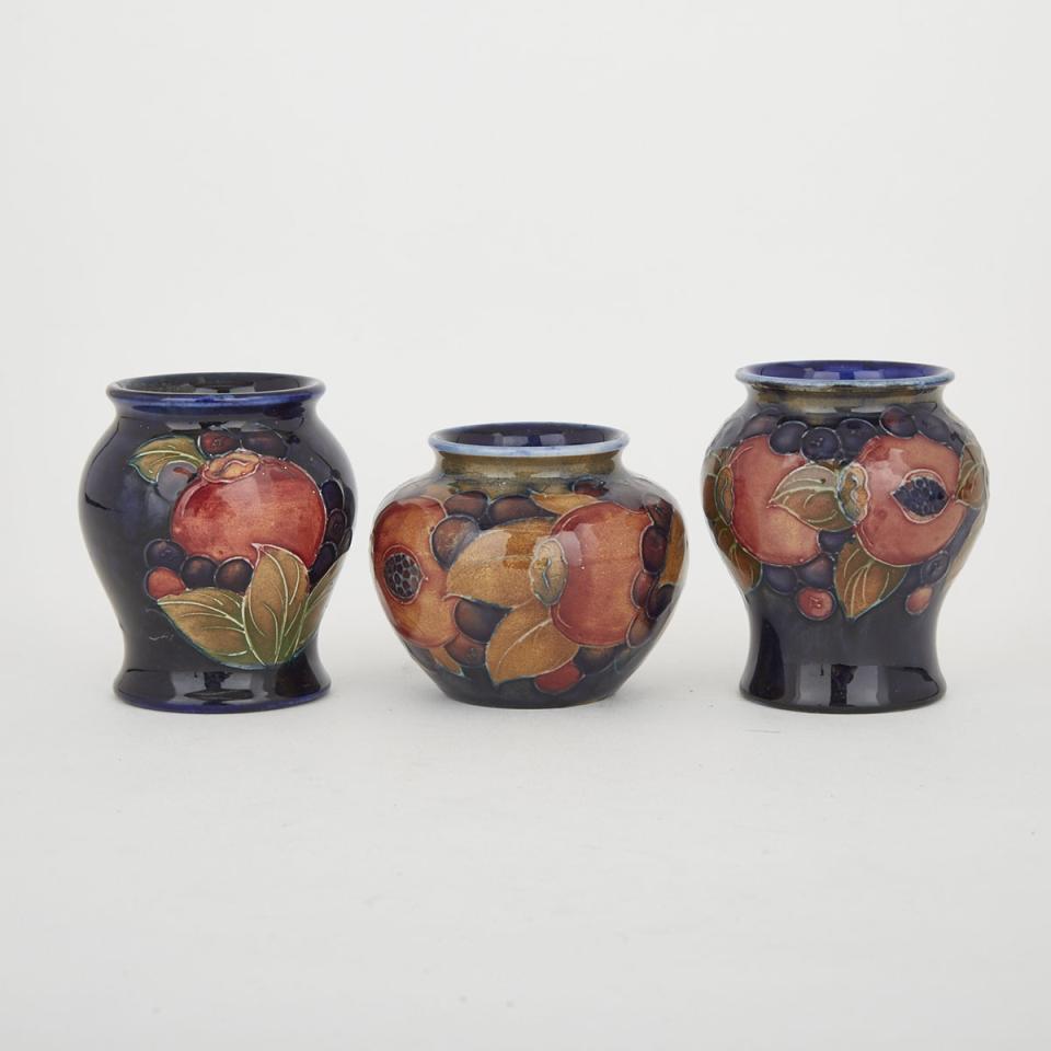 Three Moorcroft Pomegranate Small Vases, c.1920-35
