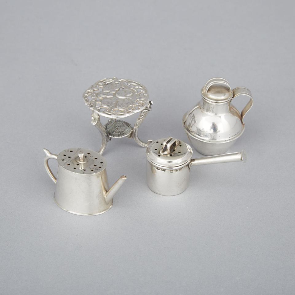 Late Victorian and Later English Silver Miniature Channel Islands Milk Jug, Two Novelty Pepper Pots and a Table, c.1900 and later