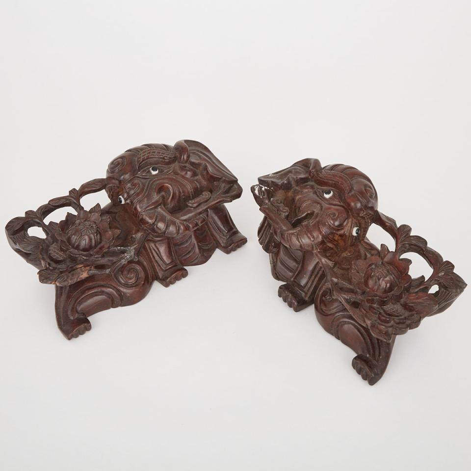 A Pair of Carved Hardwood Architectural Fragments