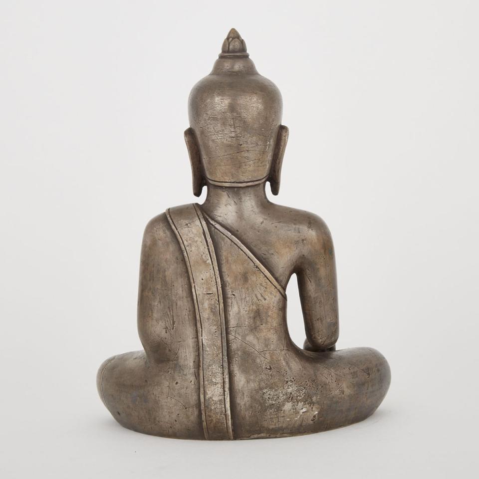 A Silver Finish Seated Buddha
