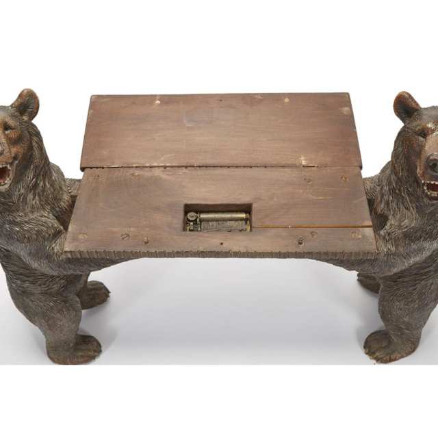 Swiss Black Forest Carved LIndenwood Bear Form Musical Bench, 19th/20th century
