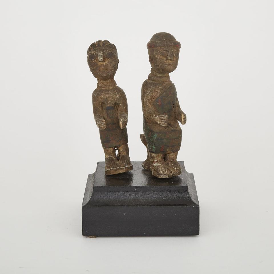 Pair of Unidentified Male and Female Figures, possibly Ewe, Central Africa