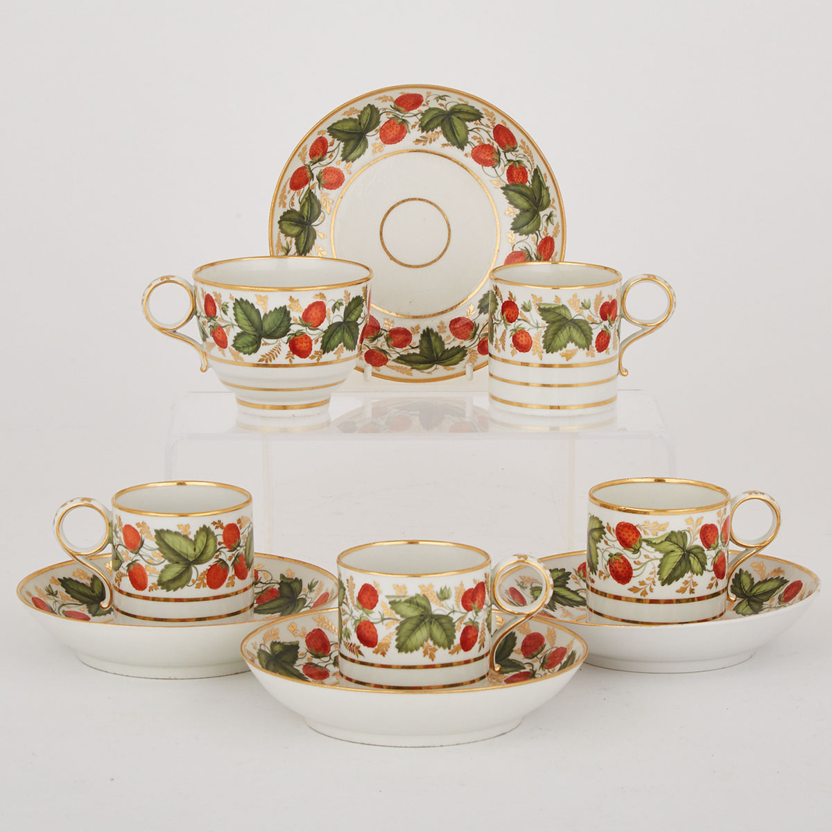 Four Flight and Barr Worcester Strawberry Banded Coffee Cans, a Cup and Four Saucers, c.1805-15