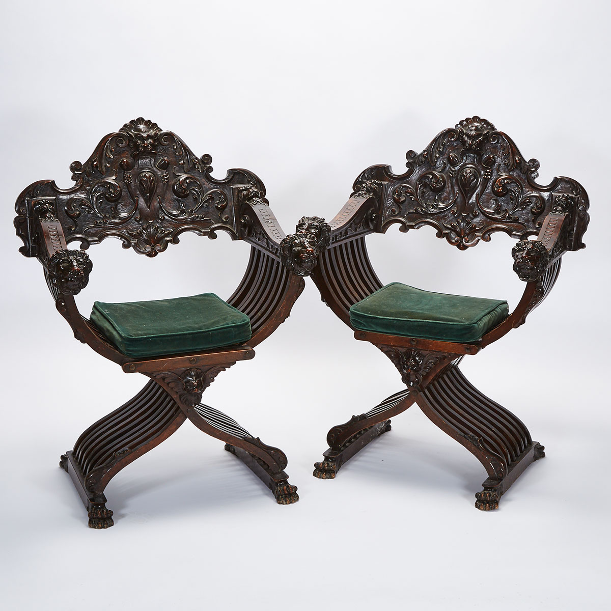 Pair of Italian Renaissance Style Carved Walnut Savonarola Chairs, 19th century