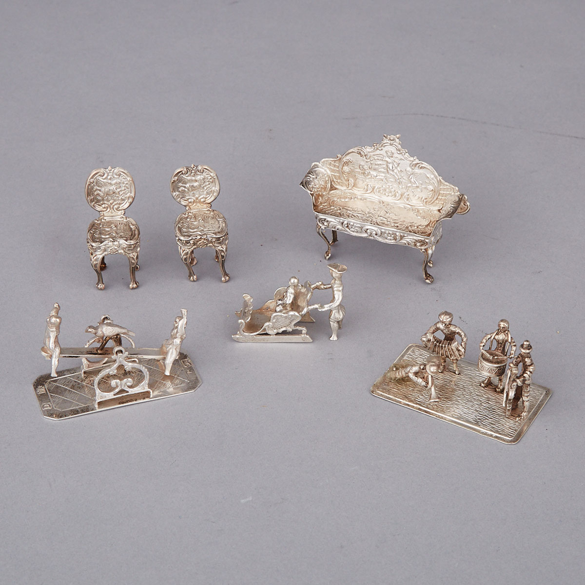 Three Dutch Silver Miniature Novelty Groups and an English Settee and Two Chairs, 20th century