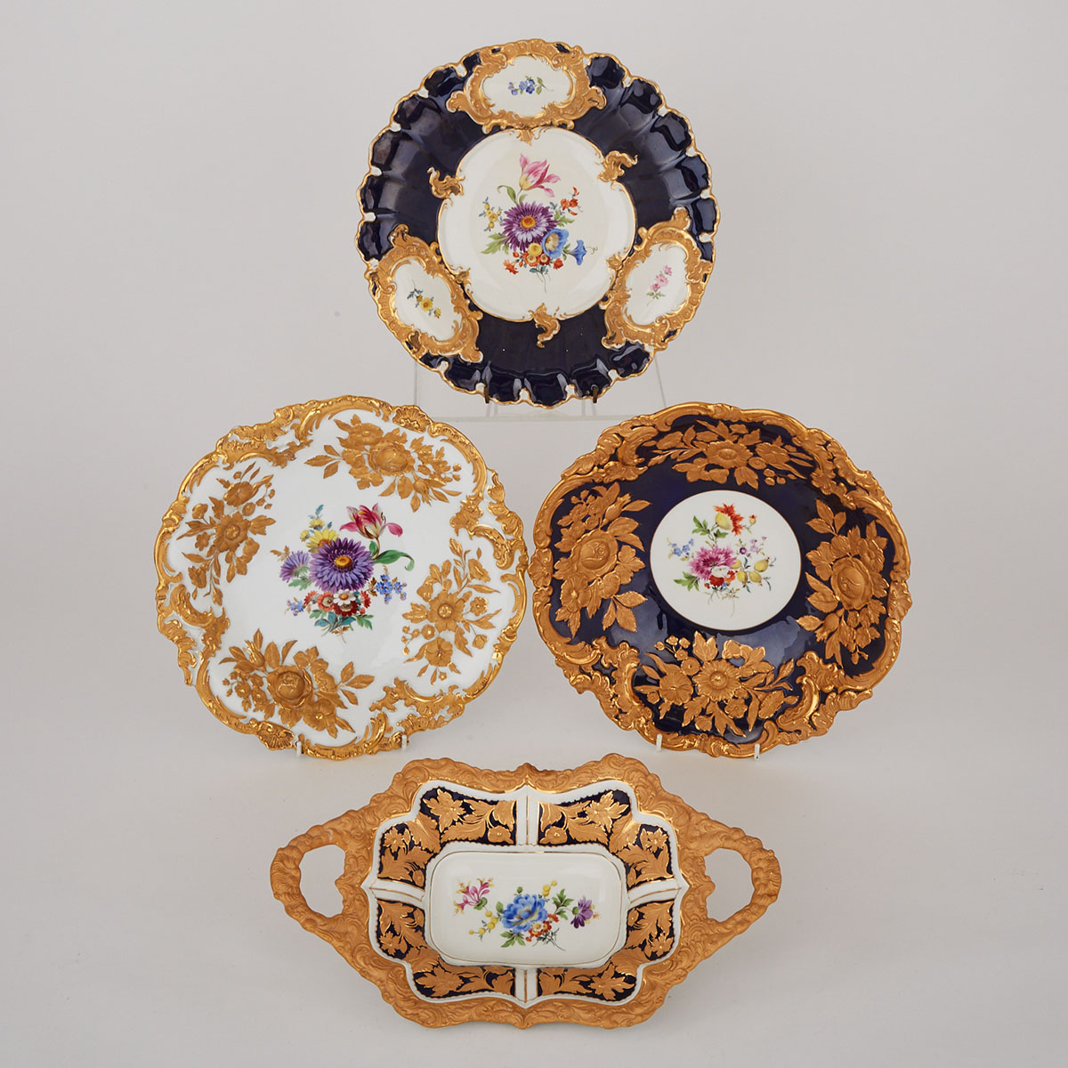 Three Meissen Floral Decorated Bowls and a Two-Handled Dish, 20th century