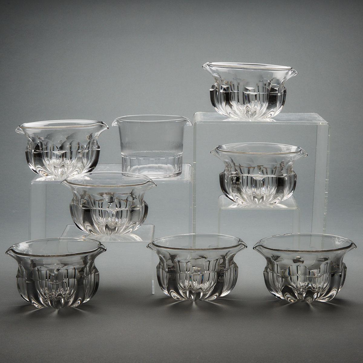 Eight Anglo-Irish Moulded and Cut Glass Rinsing Bowls, 19th century