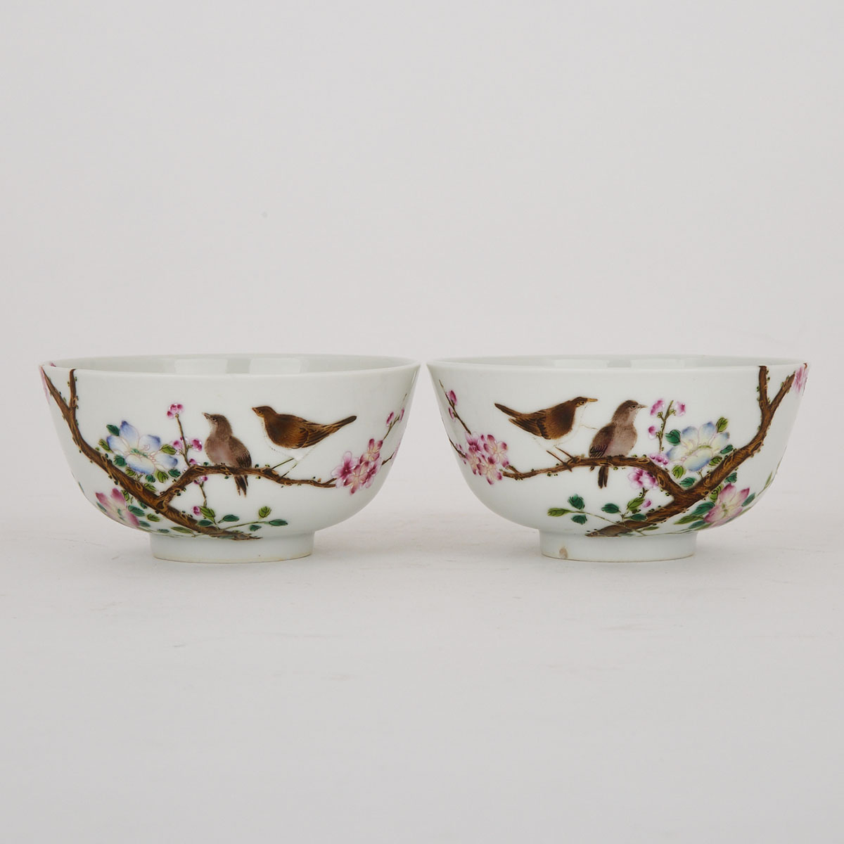 A Pair of Famille Rose ‘Birds and Flowers’ Bowls