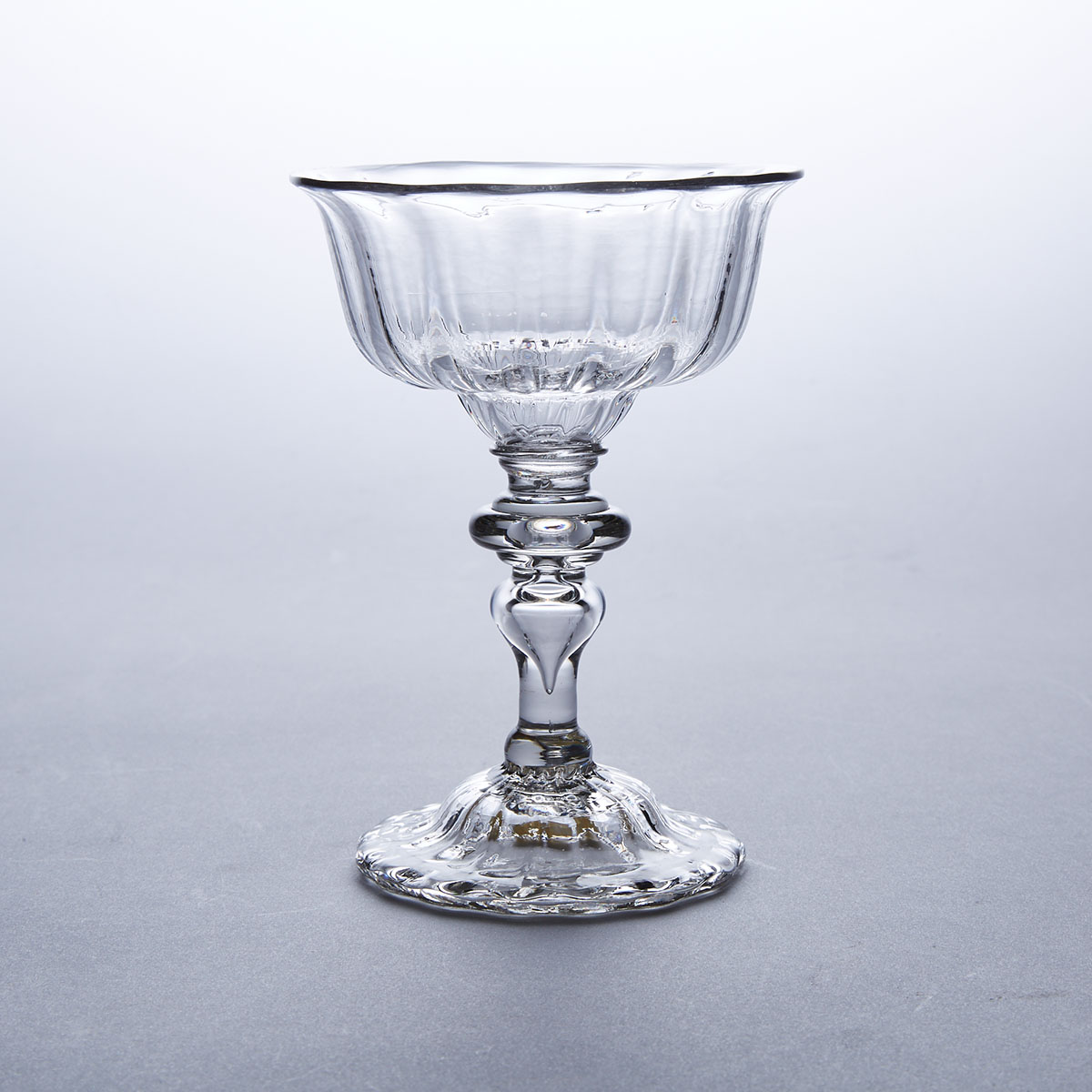 English Knopped Hollow Inverted Baluster Stemmed Sweetmeat or Champagne Glass, mid-18th century