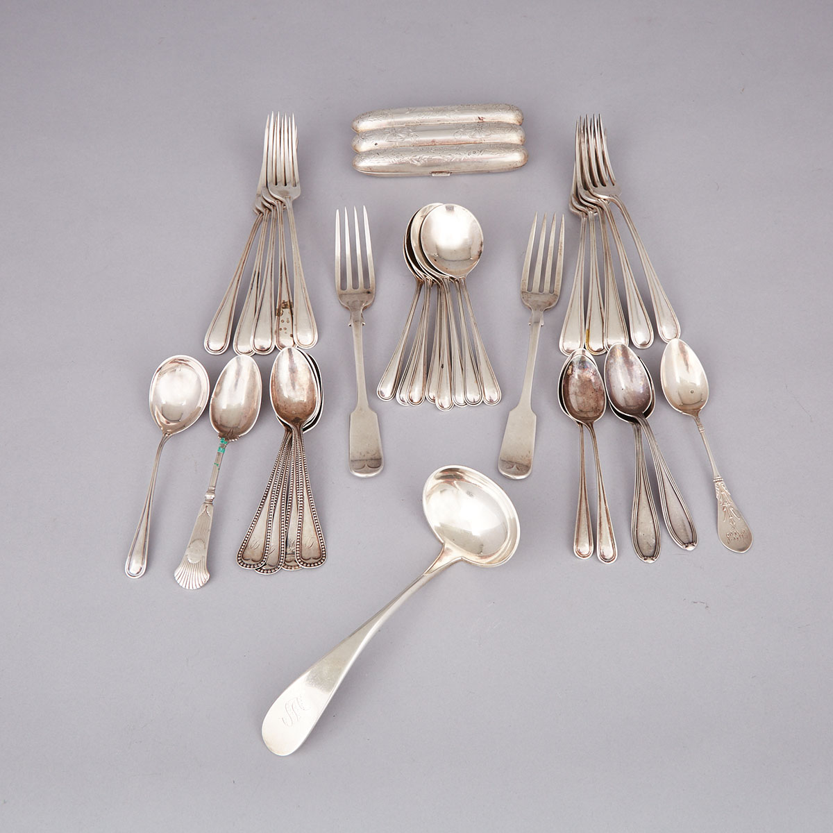 North American Silver Cigar Case and Thirty-Two Pieces of Flatware, late 19th/20th century