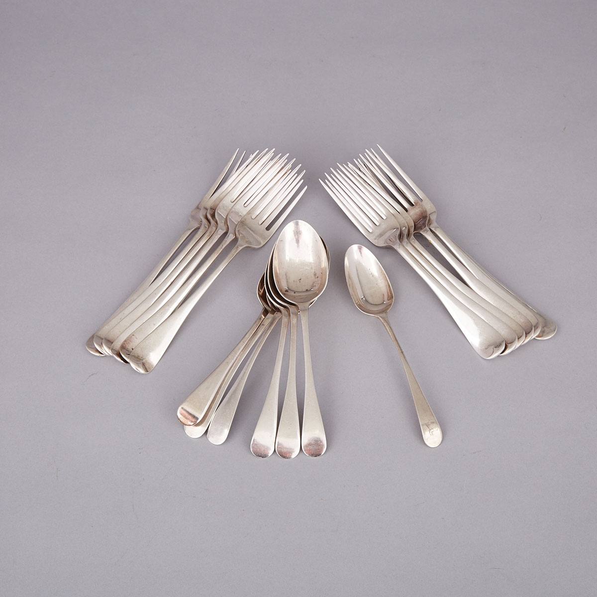 Twelve George III and Later Silver Old English Pattern Table Forks and Seven Dessert Spoons, 19th/20th century
