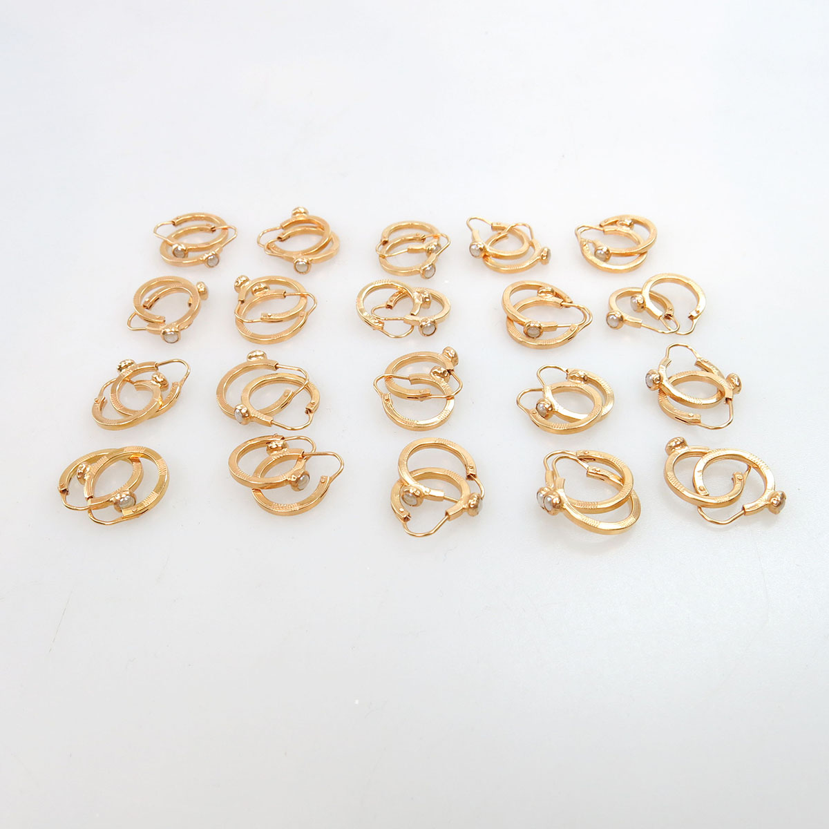 20 Pairs Of Small 18k Yellow Gold Hoop Earrings